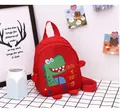 Close-up of red toddler backpack featuring a cute green dinosaur and adjustable straps - Red