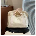 Bolso tote minimalista de lona blanco crema con correas rosas y bolsillo lateral - Blanco