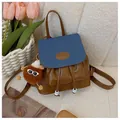 Brown and navy blue color-block faux leather backpack with a cute plush monster charm - With Pendant-Brown / Blue and Brown