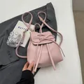 Chic pink PU leather backpack with bow tie detail and drawstring closure for women - Pink