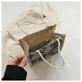 Ethnic linen tote bag with rainbow weaving and cotton rope handles, showing spacious interior - Black Zipper Style