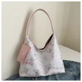 White hobo shoulder bag with pink butterfly print and matching square pouch charm - Pink
