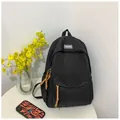 Minimalistische zwarte rugzak met mode-label en bruine lederen trekkers voor school - 28*12*40cm / Zwart
