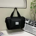 Large black nylon folding travel bag with Hong Fu branding and sturdy handles - Black