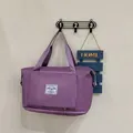 Purple nylon foldable travel bag with large capacity and bottom expansion zipper detail - Taro Purple