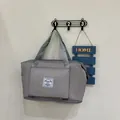 Gray foldable travel bag with large capacity for gym and short trips with carry handles - Gray