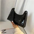 Klassische schwarze Handtasche mit Krokodilmuster aus glänzendem Kunstleder für Damen - Schwarz