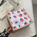 Cute canvas tote bag with strawberry prints and natural jute side panels and rope handles - Strawberry