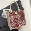 Ethnic canvas tote bag with colorful geometric patterns and vintage wooden button - Button Decor Style / Red