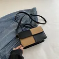 Bolso bandolera bicolor en caqui y negro con correa ajustable y asa superior - Marrón