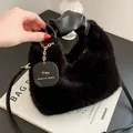 Black faux fur tote bag with scrunchie handle and stylish 'You deserve better' tag - Black
