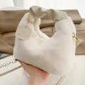 White plush shoulder bag with a ruched faux leather handle and gold chain detail - Off White