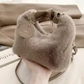 Mocha plush faux fur handbag with leather pleated handle and gold chain strap - Coffee