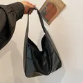 Minimalist black faux leather large hobo shoulder bag for daily commuting - Black
