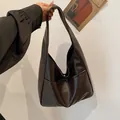 Dark coffee brown faux leather tote bag with wide strap for daily commuting - Brown