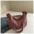Pink corduroy crossbody tote bag with circular embroidery and adjustable strap - Pink