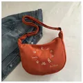 Orange corduroy hobo bag with white letter embroidery and adjustable strap - Orange
