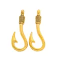 Macro detail of golden fish hook pendants with vintage textured metal finish - Antique Gold