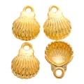Detailed view of golden seashell pendants with textured ridges and top hanging loops - Gold