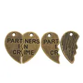 Vintage bronze heart pendant with Partners in Crime engraving and serrated split design - Heart Splicing Style / Antique Bronze