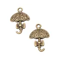 Vintage bronze umbrella pendants with floral carvings and bow details for DIY jewelry - Bronze