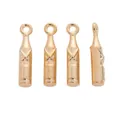 Detailed view of four golden bottle-shaped vintage alloy charms with embossed X design - KC Gold