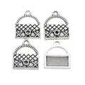 Macro detail of retro zinc alloy handbag charms with quilted texture for DIY jewelry making - Antique Silver