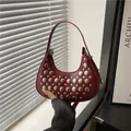Deep red crescent moon rivet bag with metallic studs for a trendy commute look - Red
