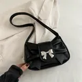 Black vintage shoulder bag with large pleated bow and silver metal butterfly buckle - Black