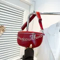 Red patent leather chest bag with silver chain and wide woven strap for women - Red