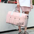 Bolsa de deporte rosa de gran capacidad con correa y logotipo Nichao Gym - Rosa