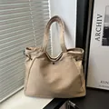 Minimalist large khaki tote bag with drawstring sides and metal snap pocket detail - No Pendant / Khaki