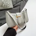 Light gray crescent underarm bag with gold metal buckle and leather strap for women - Gray