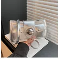 Metallic silver underarm bag with retro metal buckle and front snap pockets for women - Silver