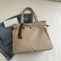 Khaki large capacity tote bag with side drawstrings and stylish knot pendant - With Pendant / Khaki