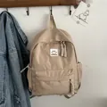 Sac à dos minimaliste en nylon kaki avec patch sourire et grande capacité pour l'école - Kaki