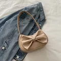 Bolso de hombro Y2K beige con lazo de cuero liso sobre tejido vaquero azul - Caqui