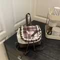 Brown and white star print backpack with check pattern flap and lace bow detail - Brown