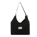 Large black canvas tote bag with fashion bear label and adjustable shoulder strap - Black