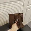 Brown frosted leather shoulder bag with fringe detail and metal buckle in retro style - Coffee