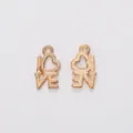 Detail of vintage gold heart-shaped LOVE letter pendants for DIY jewelry making - KC Gold