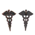 Detail of Caduceus wing snake pendant in antique copper with front and back views - 30x20 / Antique Red Copper