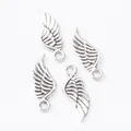Set of four vintage silver zinc alloy wing charms for DIY jewelry making and accessories - Antique Silver