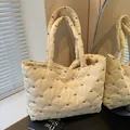 Quilted tote bag with brown bow embroidery and rhombus pattern for casual commuting - Off White