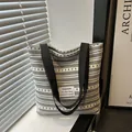 Large striped canvas tote bag in black and white with black woven handles for daily use - Black