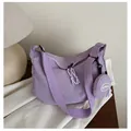 Minimalist light purple crossbody tote bag with matching round charm pouch accessory - Purple