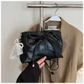 Black ballet-style shoulder bag with large bow and detachable pearl lace charm - With Lace Pearl Charm / Black