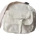 Minimalistische beige Cord-Umhängetasche mit Streifenstruktur und gewebtem Seil-Detail - Ohne Anhänger / Weiß