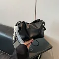 Black matte leather pleated cloud bag with elegant pearl and lace decorative pendant - With Pendant / Black