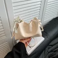 Chic off-white pleated bucket bag with pearl lace bow detail and slim shoulder strap - With Pendant / White